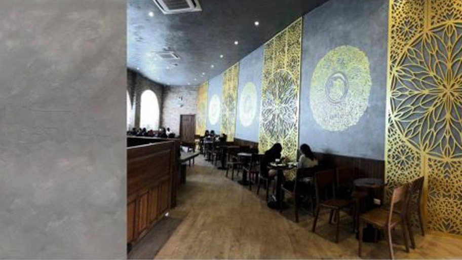 Quán cafe sử dụng sơn hiệu ứng màu xám trung tính